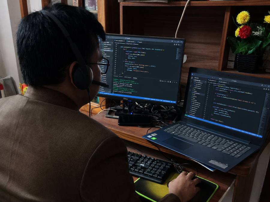Web Topaz team member on a client call